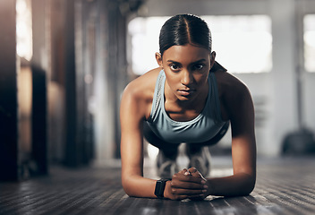 Image showing Push ups, training and portrait of woman in gym for challenge, exercise and performance. Health, strong and sports with female bodybuilder and workout in fitness center for energy, wellness or focus