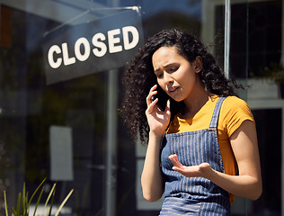 Image showing Woman, closed business and sign in window with phone call, stress and bankruptcy with cafe closing. Contact, fail and problem, female owner of restaurant with financial crisis and communication