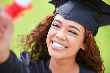 Image showing Young woman, graduate and portrait with certificate, smile and celebration for success, goal and dream at college. University student, girl and happy with diploma, pride and excited for graduation