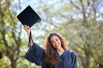 Image showing Celebration, happy and portrait of a woman at her graduation standing outdoor at university. Happiness, smile and female student with graduate cap for success and college degree achievement on campus