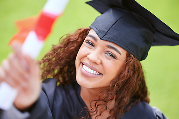 Image showing Young woman, graduation portrait and certificate with smile, celebration and success with goal, dream and college. University student, girl graduate and happy with diploma, pride and achievement