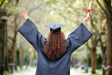 Image showing Celebration, back view of university student and with certificate outdoors. Success or achievement, graduate or happiness and winner woman at college campus outside on graduation day for diploma