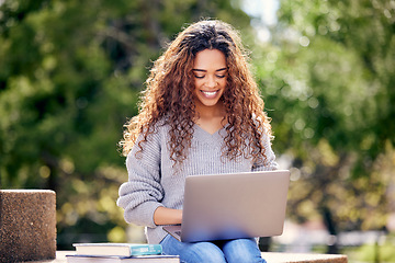 Image showing Student, laptop and woman with books at park outdoor for education, research or studying. Happy African female on university or college campus in nature with tech for knowledge, internet or learning