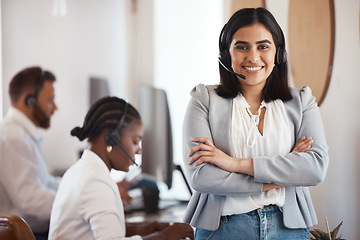 Image showing Happy, portrait of woman with a headset and arms crossed in her modern office at her workplace. Telemarketing or call center, online communication and female person smile for customer service