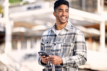 Image showing Retail, city and man with a smartphone, shopping and connection with boutique item, buyer and customer. Male person, client or shopper with a cellphone, outdoor or fashion with mobile app or products