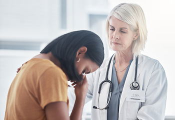 Image showing Healthcare, empathy and doctor with a woman after diagnosis of cancer or sickness. Sad, comfort and grieving patient crying for results in a consultation with a female medical worker in the hospital.