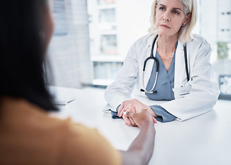 Image showing Consulting, support and holding hands of doctor and patient for medical, empathy and advice. Medicine, healthcare and help with women in hospital exam room for depression, compassion and hope