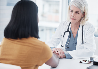 Image showing Empathy, compassion and holding hands of doctor and patient for medical, trust and advice. Medicine, healthcare and help with women in hospital consulting room for depression, support and hope