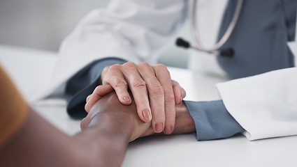 Image showing Empathy, closeup and holding hands of doctor and patient for medical, support and advice. Medicine, healthcare and help with people in hospital consulting room for depression, compassion and hope