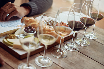 Image showing Wine tasting, cheese board and winery restaurant with alcohol and glass for customer. Eating, drink and person with rich wines and food pairing in a fine dining and luxury snack experience alone