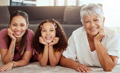 Image showing Happy, generations and portrait with family on floor of living room for bonding, smile and love. Happiness, faces and grandmother with young child and mom at home for solidarity, support and weekend