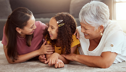 Image showing Smile, generations and relax with family on floor of living room for bonding, care and love. Happiness, trust and grandmother with young child and excited mom at home for play, support and together