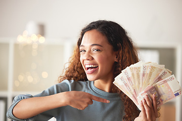 Image showing Happy woman is pointing at cash fan, savings and finance with success and celebrate financial goals. Budget, winning and wealth with money, investment and female person winner with salary bonus