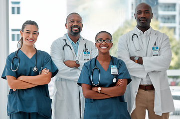 Image showing Hospital, collaboration and portrait of doctors with crossed arms for medical care, wellness and support. Healthcare, happy and men and women workers for cardiology service, consulting or insurance