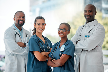 Image showing Hospital, happy team and portrait of doctors with crossed arms for medical care, wellness and support. Healthcare, diversity and men and women workers for service, medicine and consulting in clinic