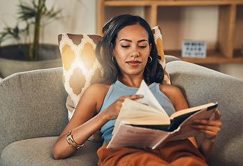 Image showing Woman relax on couch, reading book at house and break on the weekend with literature, fantasy story and peace. Female person with hobby, leisure and chill at home, read for knowledge and information
