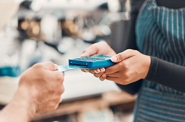 Image showing Credit card, machine and hands for payment in a coffee shop for shopping, bills or sale with technology. Contactless paying, electronic transaction or closeup of cafe customer at cashier for checkout