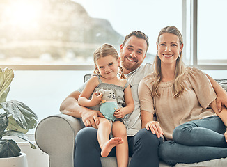 Image showing Portrait of mother, father and child on sofa in living room for bonding, quality time and relax together. Happy family, smile and mom and dad with girl for care, love and happiness at home on weekend