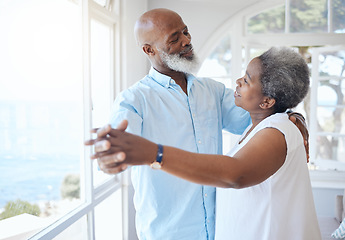 Image showing Black couple, dancing and together in senior home with love, care and commitment. Happy african man and woman relax and dance to enjoy marriage, retirement and happiness while holding hands