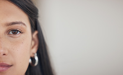 Image showing Split face, mockup and portrait of a woman with clean, glow and healthy skin in studio. Beauty, skincare and closeup zoom of female model by background with mock up space for advertising or marketing