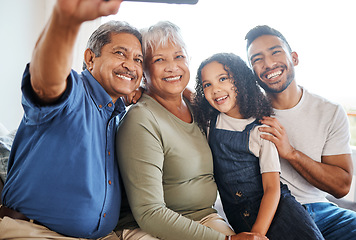 Image showing Happy family, smile and selfie in living room for social media, vlog or online post at home. Grandparents, father and child smiling for photo, memory or profile picture together on holiday weekend