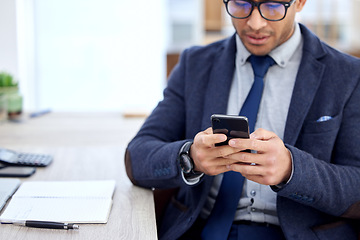 Image showing Phone, typing and business man in office for social networking, online communication and search internet. Website, mobile chat and corporate worker, employee or person reading email, news or feedback