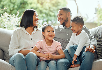 Image showing Family, parents laughing with children and relax on couch with happiness and love while at home. Bonding, care and humor with relationship, people together in living room with mom, dad and kids