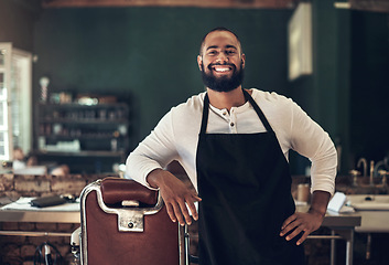 Image showing Barber shop, hair stylist smile and black man portrait of an entrepreneur feeling happy. Salon, professional worker and male person face with happiness and proud from small business and beauty parlor