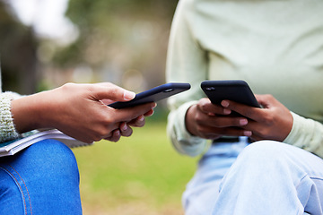 Image showing Closeup, woman students and smartphone or hands text or type email together at university or social media or research and on bokeh. Mobile. technology and college girls chat or connect on campus