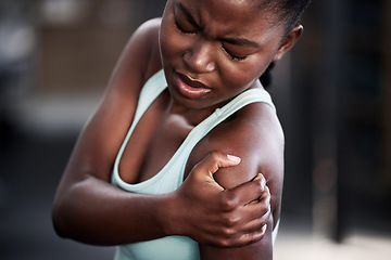 Image showing Sports, health and woman with shoulder injury or pain or workout accident and on mockup. Fitness, train and African female athlete with a medical emergency or sprain muscle after a cardio exercise.