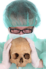 Image showing surgeon with skull