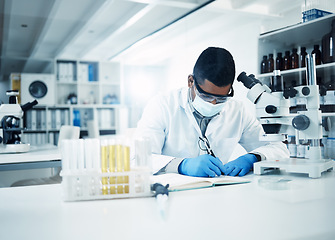 Image showing Man, scientist and writing notes in research for discovery, breakthrough innovation and information at lab. Male person, science professional and notebook for scientific data of results in laboratory