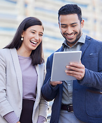 Image showing Business people, tablet and team laughing outdoor in a city with internet connection for social media. Happy man and woman together on urban background with tech for networking, communication or app