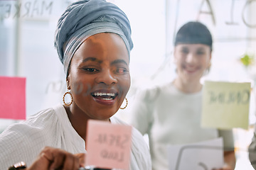 Image showing Teamwork, planning and business people on glass board in brainstorming, project workflow and happy for goals. Diversity employees or African woman ideas, collaboration and solution on sticky notes