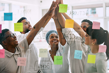 Image showing High five, business people and sticky notes for success, teamwork and collaboration goals, winning or support. Yes, celebration and happy women, men or team hands together for help or target on glass