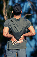Image showing Man, back pain and fitness injury outdoor after accident, exercise or sports workout. Spine, problem and male athlete with arthritis, fibromyalgia emergency or muscle inflammation for wound in forest