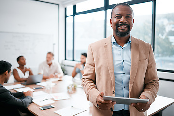 Image showing Black man in business, smile in portrait and tablet, leadership and presentation with group for corporate project. Team leader, digital and meeting with male speaker in conference room with tech