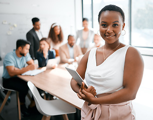 Image showing Black woman in business, smile in portrait and tablet, leadership and meeting with corporate group. Team leader, wireless tech and confidence with female person in conference room for presentation