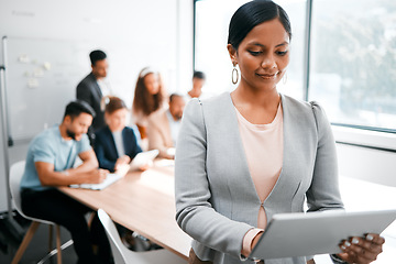 Image showing Business woman, smile and tablet with leadership and meeting with group for corporate project. Team leader, management and digital tech with female person in conference room for presentation