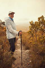 Image showing Trekking pole, hiking and travel with portrait of old woman in nature for wellness, fitness and retirement. Journey, freedom and senior hiker walking in outdoors for environment, adventure or sunrise
