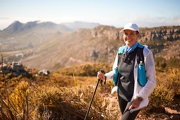 Image showing Mountings, hiking and portrait with old woman in nature for wellness, fitness and retirement. Happy, freedom and travel with senior hiker trekking in outdoors for environment, adventure and summer