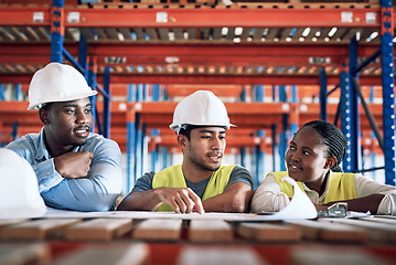 Image showing People, architect and blueprint documents for construction, team planning or meeting on site. Engineer group or contractor in teamwork discussion on floor plan, brainstorming or building strategy