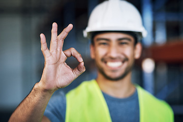 Image showing Happy man, architect and hands with okay sign for construction success or good job on site. Hand of male person, engineer or contractor showing OK emoji, yes or perfect gesture for architecture