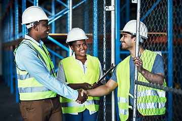 Image showing Contractor, partnership and shake hands at construction site for meeting by leadership. Builder, agreement and warehouse with shaking hand for hiring and collaboration in building industry for a job.