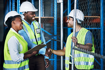 Image showing Contractor, team and shake hands at a warehouse for hiring and collaboration at a building company. Builder, together and shaking hand at a construction site for partnership and welcome by leader.