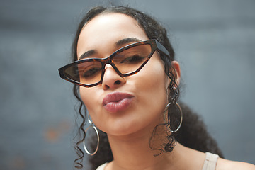 Image showing Fashion, pout and portrait of woman on wall background with makeup, cosmetics and accessories. Beauty, attitude and happy female person pose in city with sunglasses, confidence and style outdoors