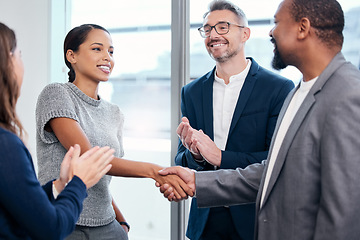 Image showing Business people, handshake and clapping in meeting celebration, success promotion or HR thank you. Corporate partnership, woman shaking hands and b2b onboarding, congratulations or career welcome