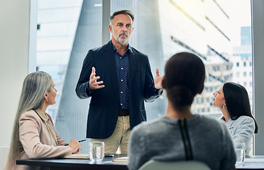 Image showing Businessman, coaching and meeting in seminar for strategy, planning or team discussion at office. Man CEO, mentor or coach training staff in teamwork, project plan or ideas in conference at workplace