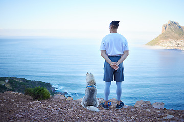 Image showing Mountain, lake and back of man with dog for hiking, walking and fresh air together outdoors. Traveling, friendship and male person with pet husky relax for freedom, adventure and exercise in nature