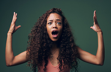 Image showing Wow, wtf and portrait of woman mind blown in studio by news, gossip or drama on green background. Omg, face and female model shocked, surprise and confused with open mouth emoji, hands or expression